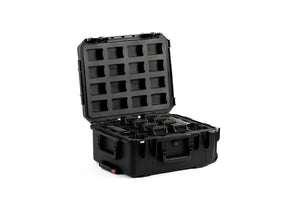 Freefly SL8 Travel Case open and loaded with batteries against a white background