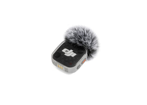 DJI Mic Mini 2S Transmitter with a black magnetic cover and windscreen